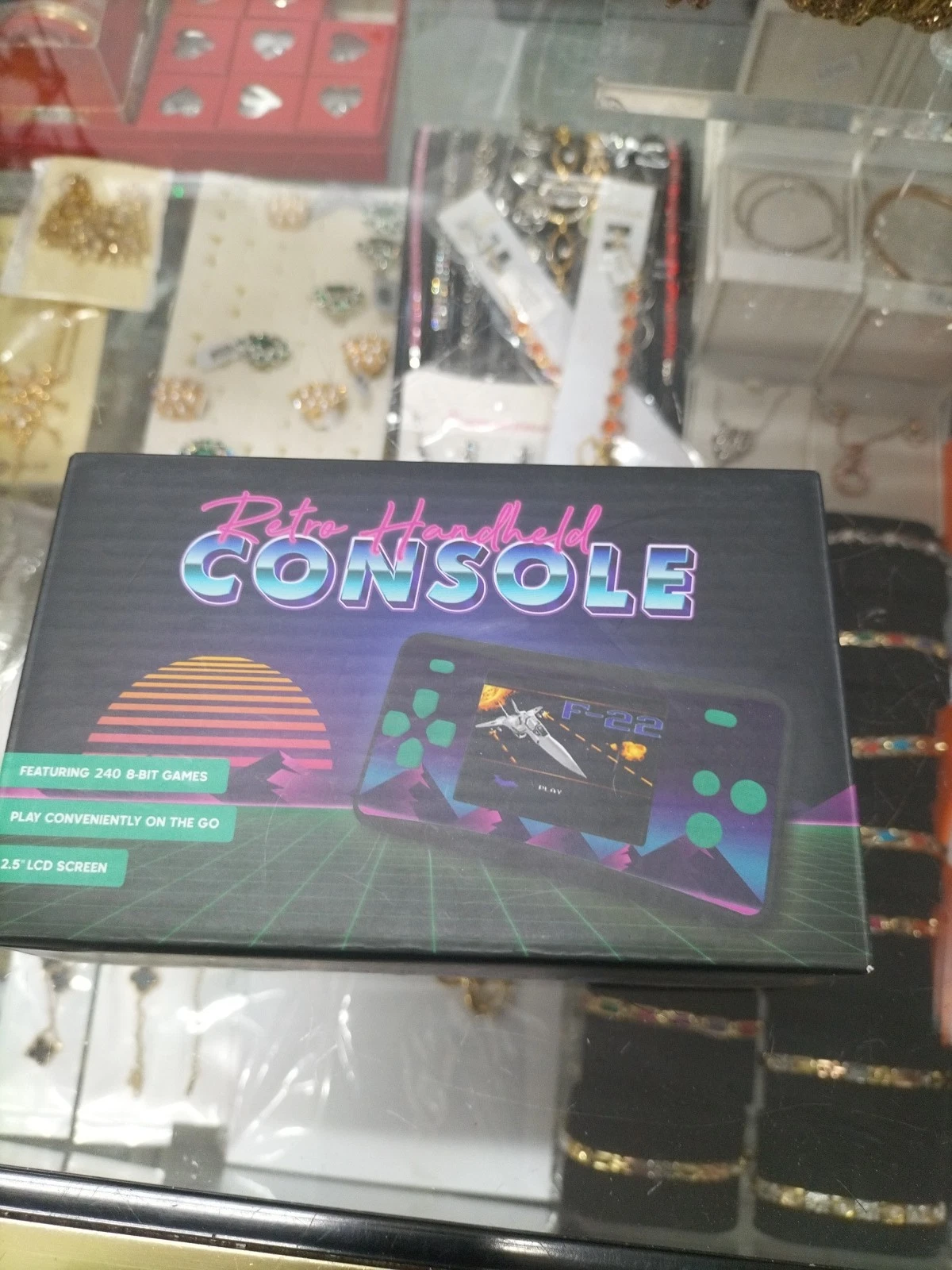 RETRO HANDHELD GAME CONSOLE, FEATURING 240 8-BIT GAMES PLAY CONVENIENTLY ON THE