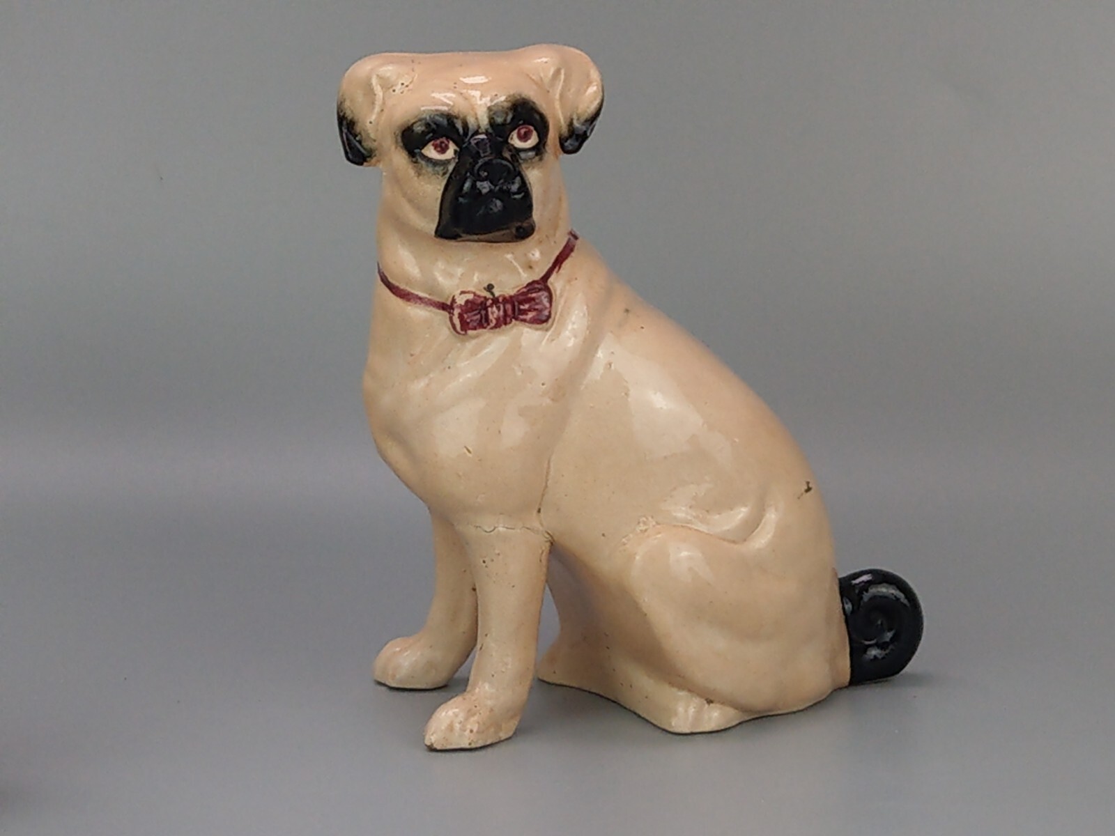 Antique Pug Dog with red Bowtie Figurine Staffordshire