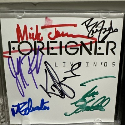 Foreigner- Signed Autographed Card In Cd Booklet.