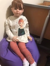 Reborn Child Angelica by Reva Schick with clothes 