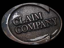 LH03103 VINTAGE 1979  CLAIM COMPANY RESTAURANT  SOUVENIR BELT BUCKLE