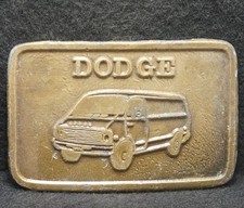 XD03107 VINTAGE 1970s  DODGE VAN  AUTOMOBILE ADVERTISEMENT BRASS BELT BUCKLE