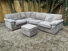 Modern grey fabric 4-5 seater corner sofa with footstool