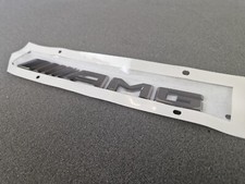 NEU Original Mercedes Benz AMG Schriftzug Schwarz Chrom Logo Embleme Aufkleber NEU Original Mercedes Benz AMG Schriftzug Schwarz Chrom Logo Embleme Aufkleber