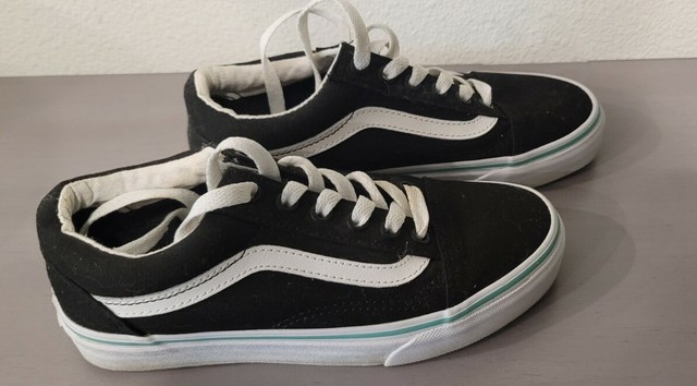 white vans slip on size 4