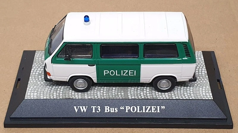 Premium ClassiXXs escala 1/43 11453 - VW T3 Bus Police - blanco/verde Foto 4 de 4