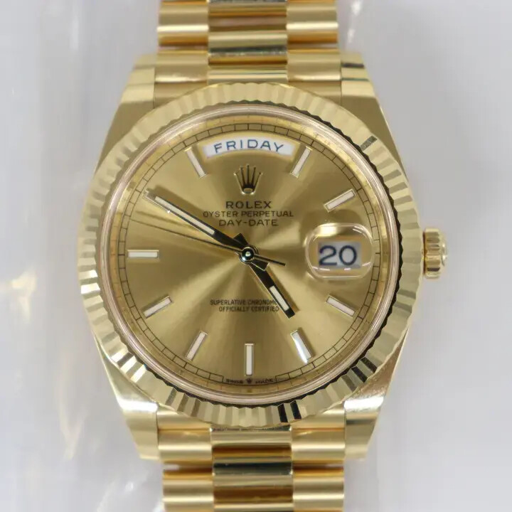 Rolex Day-Date 40mm 228238 President 18K Yellow Gold Champagne Stick Dial  Watch