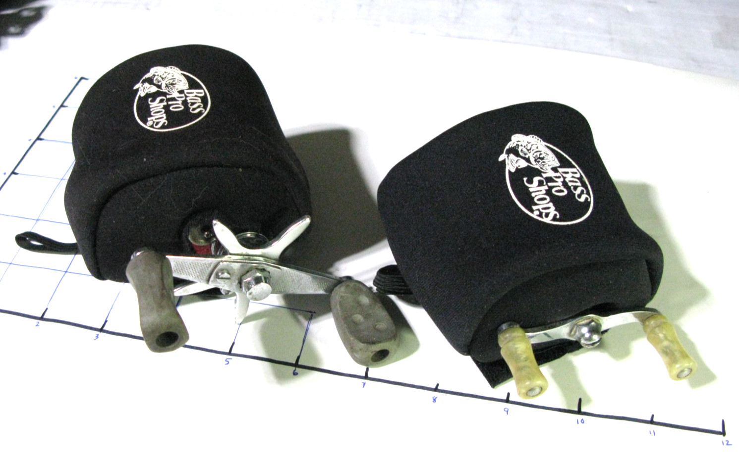 TWO (2) Bass Pro Shops Padded Round Baitcasting Reel Covers 