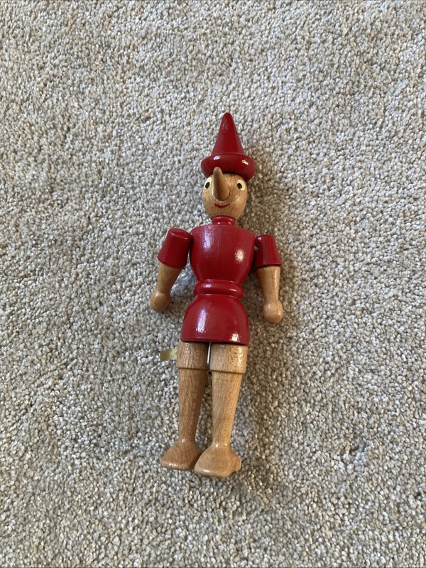 Walt Disneys Pinocchio Handcrafted Wood Figurine Made In Italy.