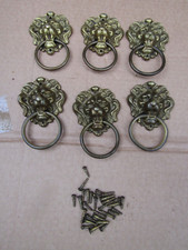 SET OF SIX BRASS LION HEAD HANDLES FROM AN EDWARDIAN SIDEBOARD APPROX 9cm x 6cm