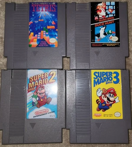 Nintendo NES game lot of 4, super mario bros 1, 2, 3, duck hunt, tetris. working