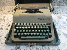 Vintage 1950s Underwood Leader Portable Typewriter with Green Key And Green Case thumbnail