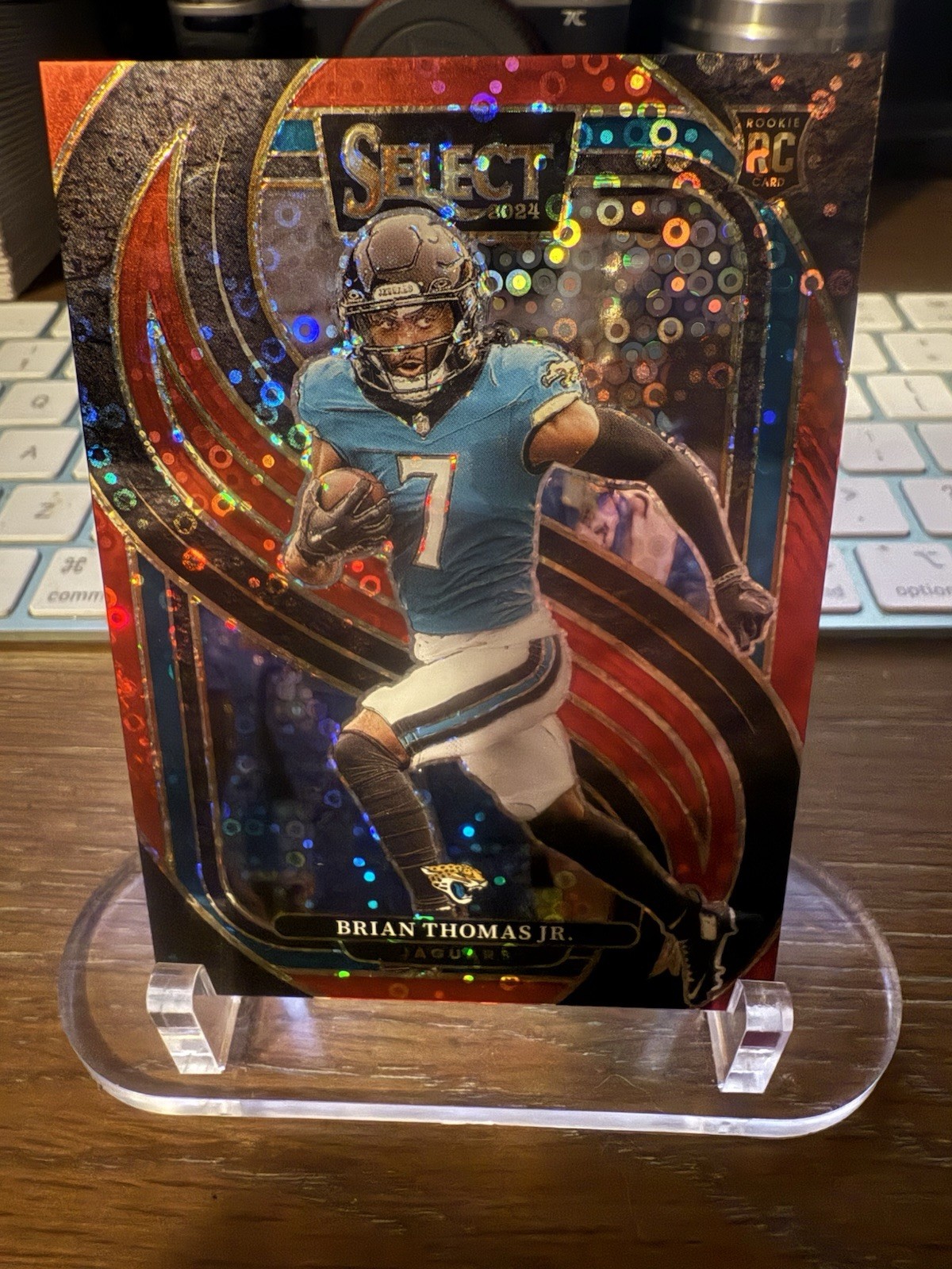 2024 Panini Select Premier Level Brian Thomas Jr. #143 Red Disco Prizm /49 (RC)