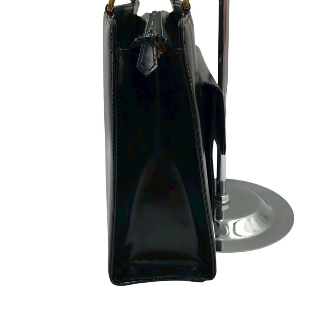 Borsa Yves Saint Laurent in pelle con logo in pelle curva vintage in metallo dorato