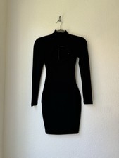 Black cut out long sleeve form fitted mini dress