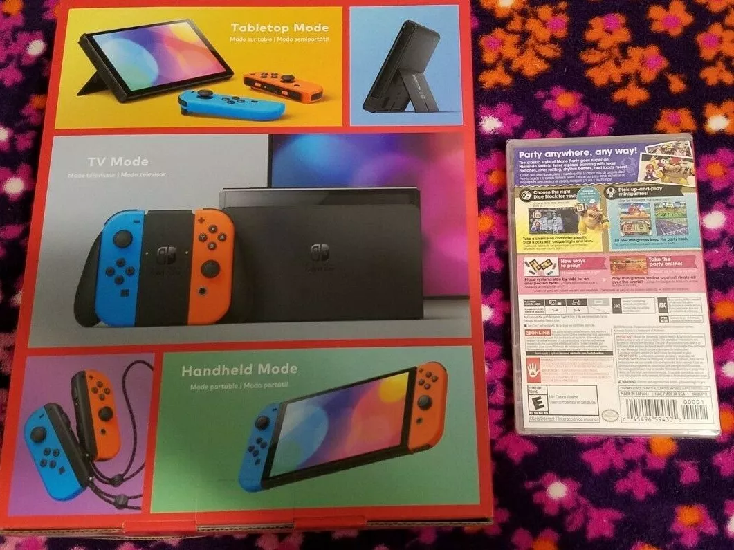 Nintendo Switch (OLED model) w/ Neon Red & Neon Blue Joy-Con 