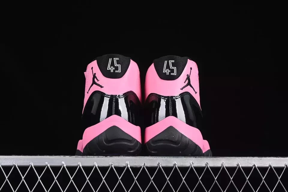 pink and black jordan 11