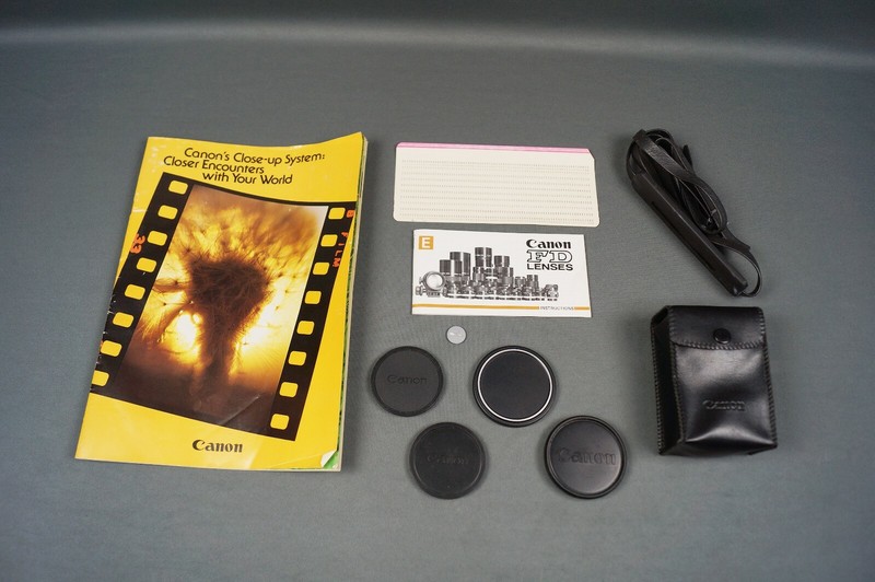CANON Camera LOT MISC ACCESSORIES 4-LENS COVERS, NECKSTRAP, MANUALS AND BAG