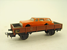 Niederbordwagen mit Schrottauto  - Märklin HO  Wagen - #257   #E  - gebr.