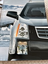 The 2004 Cadillac SRX USA Original Car Sales Brochure Collectible