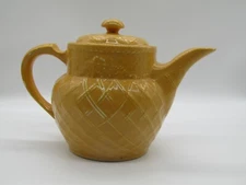 yellow basket weave teapot 7" tall by The Enterprise Aluminum Co