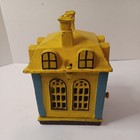 Mechanical Cast Iron Novelty Bank Building with Teller — photo 3