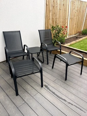 OUTDOOR LIVING Brooke 5 piece black garden bistro set with foot stools