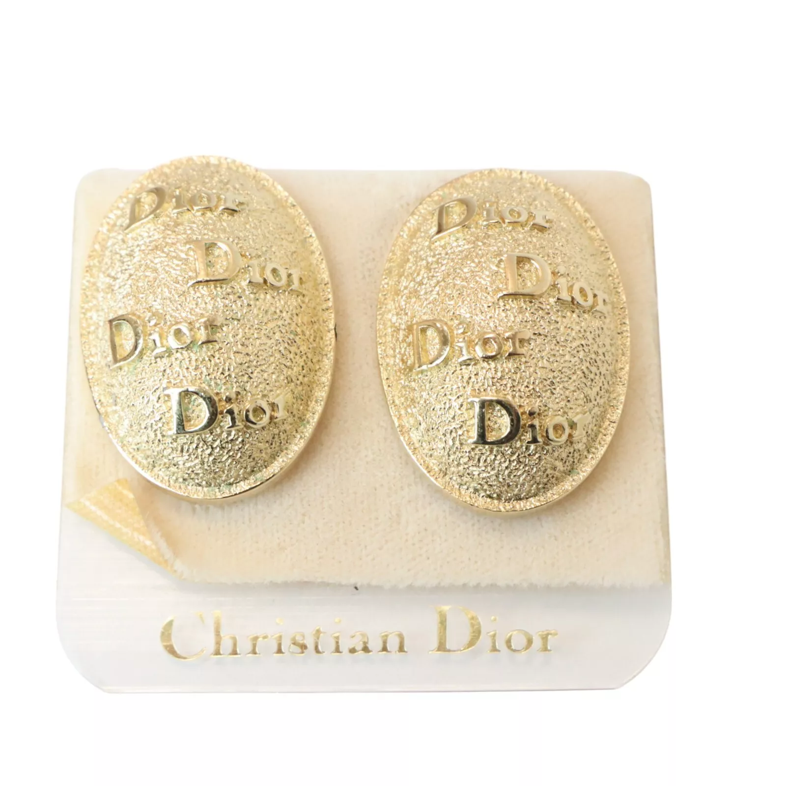 Boucles d'oreilles clips ovales plaqué or logo signature Christian Dior vintage années 80