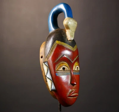 Único africano Baule Guro máscara naranja madera arte pared decoración para e... - Imagen 1 de 4