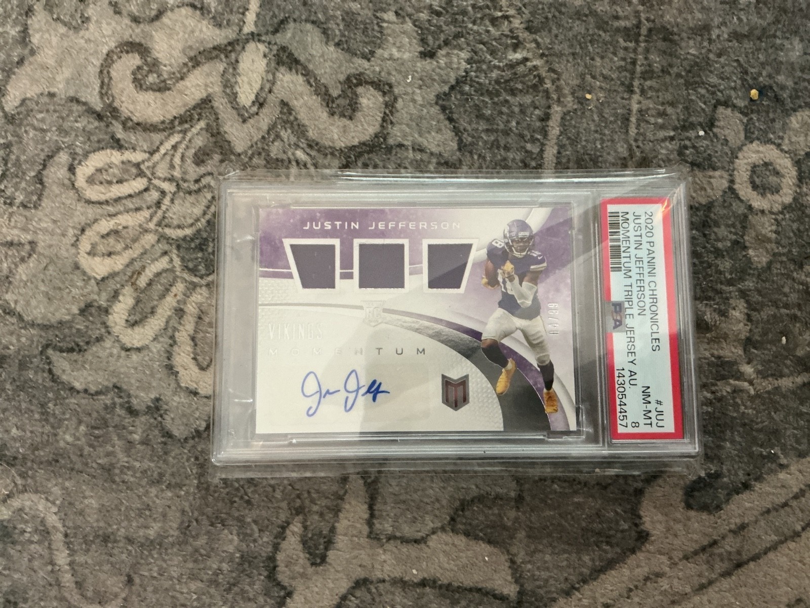 2020 Panini Chronicles Momentum Triple Jersey Autographs Justin Jefferson PSA 8 view 1