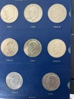 Eisenhower silver dollar/Kennedy Half Dollars Lot