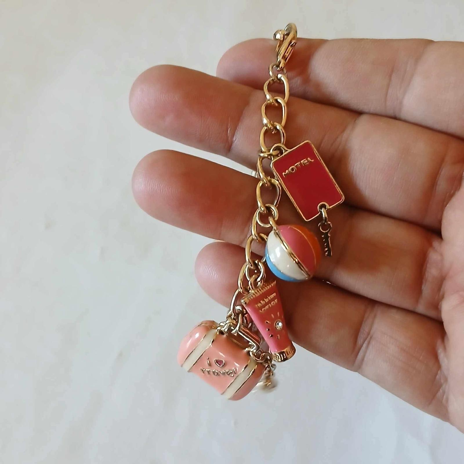 B&P SIGNIERTES GOLDFARBENES EMAILLE REISE BETTELARMBAND