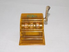 VINTAGE TRADE STIMULATOR 3 1/4" HIGH ZENO TOY SLOT MACHINE