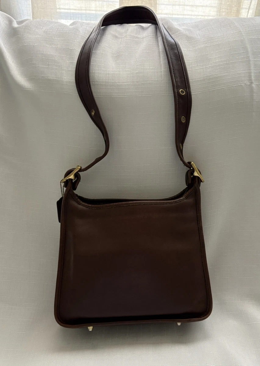 Preços baixos em Bolsa de ombro Coach Marrom Vintage Sacolas