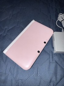 Nintendo 3DS XL Pink And White Handheld W/ Charger Pokemon Virtual Console Games