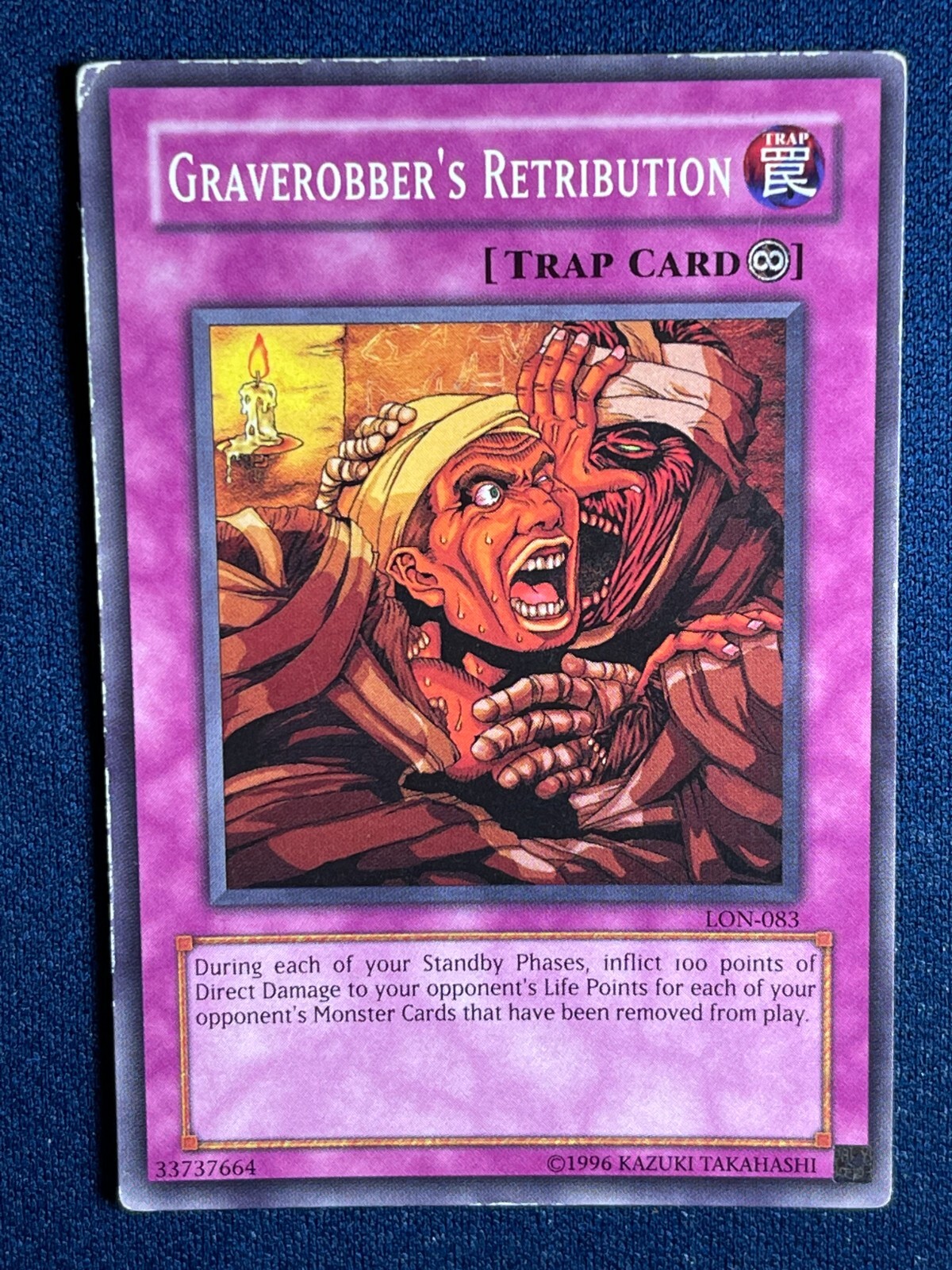 Graverobber's Retribution LON-083 YuGiOh Labyrinth of Nightmare trading card — raw and PSA graded price guide
