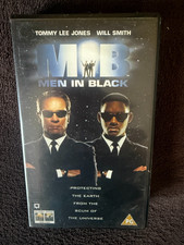VHS tape cassette. MIB: Men in Black. Will Smith, Tommy Lee Jones. 1990s Aliens.