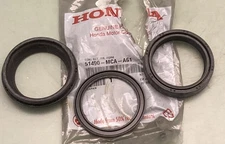 NEW GENUINE HONDA 51490-MCA-A61 FRONT FORK SEAL SET