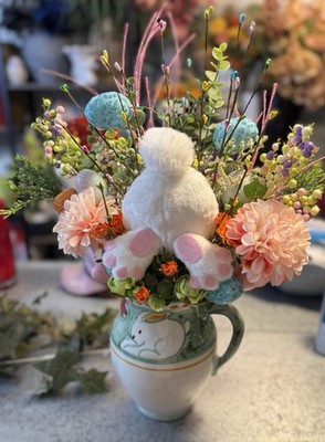Easter Bunny ceramic pitcher with florals and bunny decorations