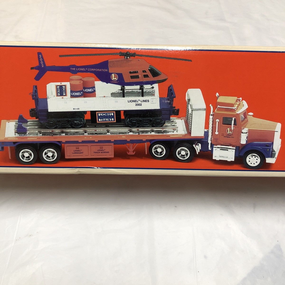 LIONEL TMT-18418 Flatbed Toy Truck And Operating Helicopter Car | eBay