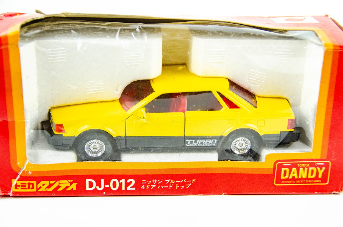Tomica Dandy 1/35 Nissan Bluebird Turbo Yellow Diecast Model Car 1
