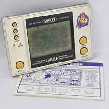 LCD Dr.SLUMP ARALE HOYOYO BOMBER Gold Game Watch Handheld Console 10000758 Popy