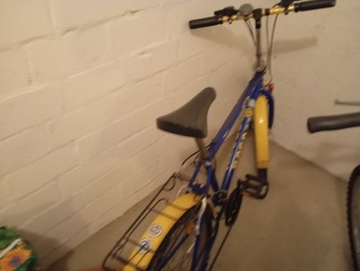 Mongoose BMX Fahrrad blau/gelb, BMX-Lenker, Fahrradständer, ohne Federung