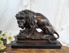Bronze lion et phacochère d'après Barye