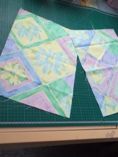 Polycotton fabric. 2 pieces..Multicoloured Geometric design. 28x39cms each.