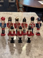 Vtg  Collection Of 9 Miniature Christmas Nut Cracker Ornaments Wood And Plastic