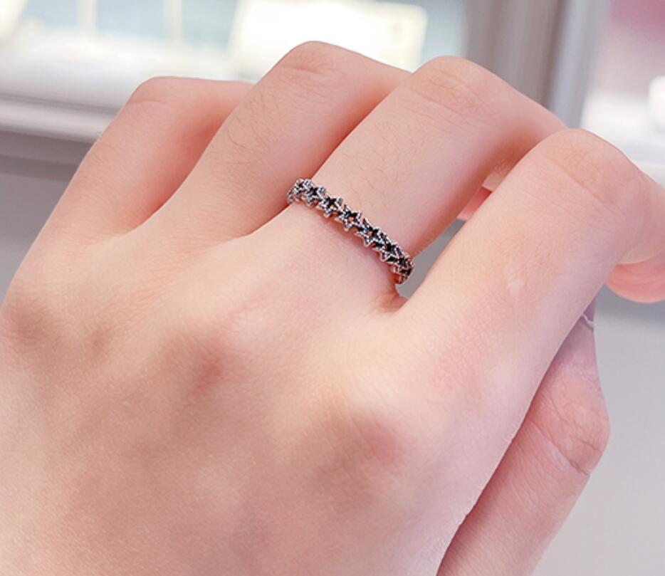 Band of Asymmetric Stars Ring