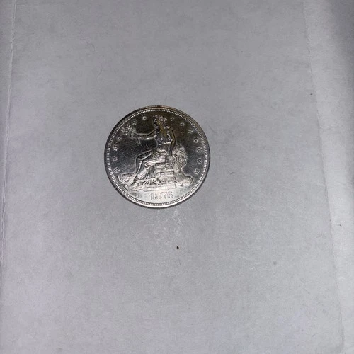1876 trade dollar AU+