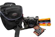 Olympus OM-10  Olympus Zuiko 50mm f/1.8 Case And Film Strap Tested