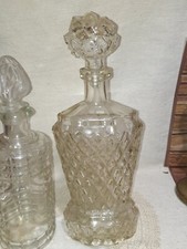 VECCHIE BOTTIGLIE VETRO LAVORATO  LIQUORE ROSOLIO H CM 32 E 28